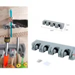 Organizador de pared para escobas y traperos con 5 ranuras, ideal para colgar herramientas de limpieza.