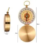 Brújula de bolsillo vintage para campismo, portátil y multifuncional, con diseño dorado.