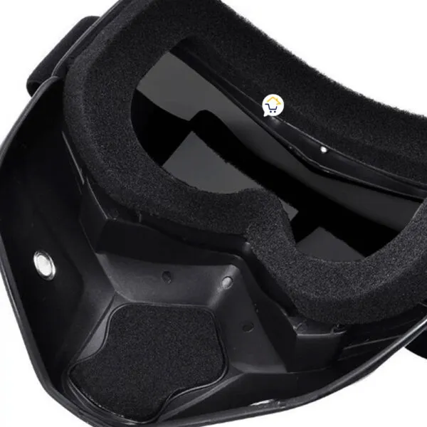 Máscara de airsoft negra con lentes reflectantes y protección facial para paintball y motocross.