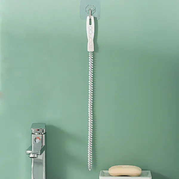 Cepillo flexible destapa cañerías de 45cm, ideal para limpieza de tuberías y drenajes.