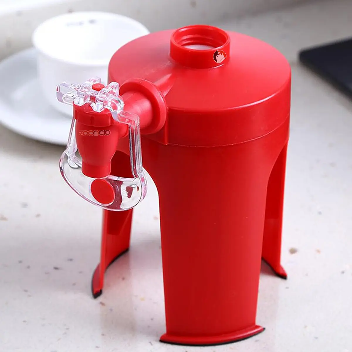 Dispensador de soda rojo con grifo transparente, ideal para fiestas y banquetes.