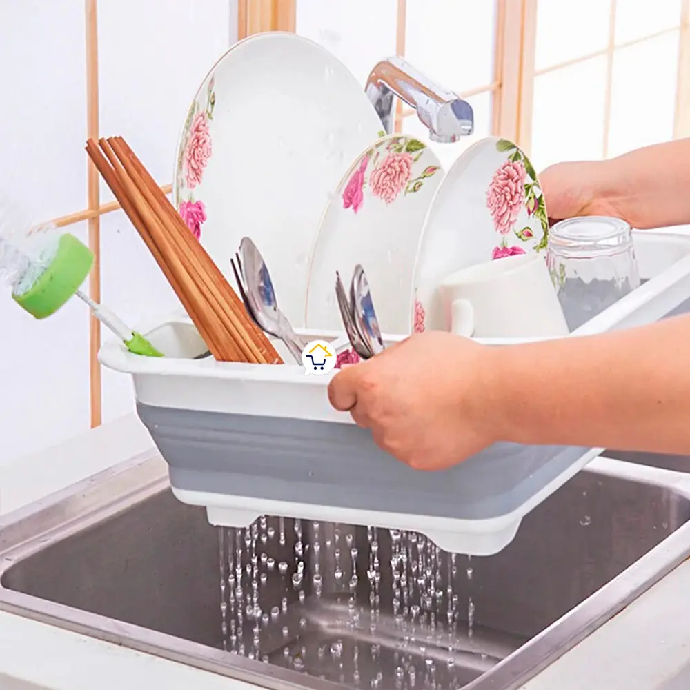 Escurridor plegable de platos Locero con cubiertos, vasos y rodillos para secar.