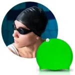 Set x2 gorros de natación en silicona verde, resistentes y durables, ideal para piscinas.