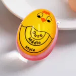 Huevo temporizador para cocción perfecta: duro, medio, mole. Diseño amarillo de pollito.