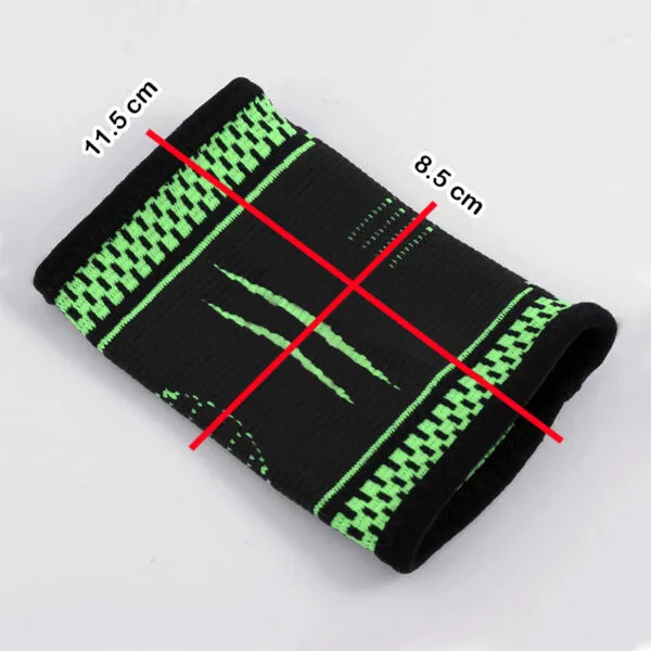 Muñequera elástica deportiva negra con verde, 11.5 cm de largo y 8.5 cm de ancho, ideal para ejercicio.