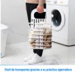 Cesta plegable para ropa sucia con toallas, fácil de transportar por su agarradera.