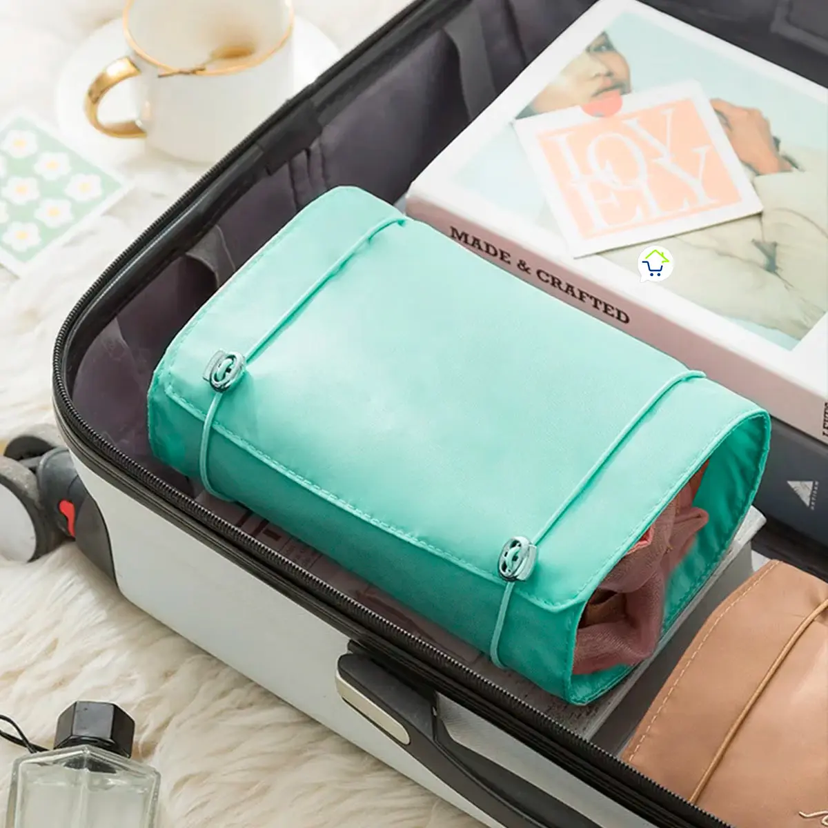 Organizador viajero con 4 cartucheras plegables y portátiles en maleta.