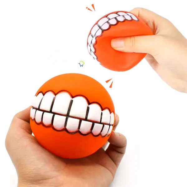 Pelota para perros de juguete con forma de sonrisa, naranja, con diseño divertido y sonido, ideal para juegos.