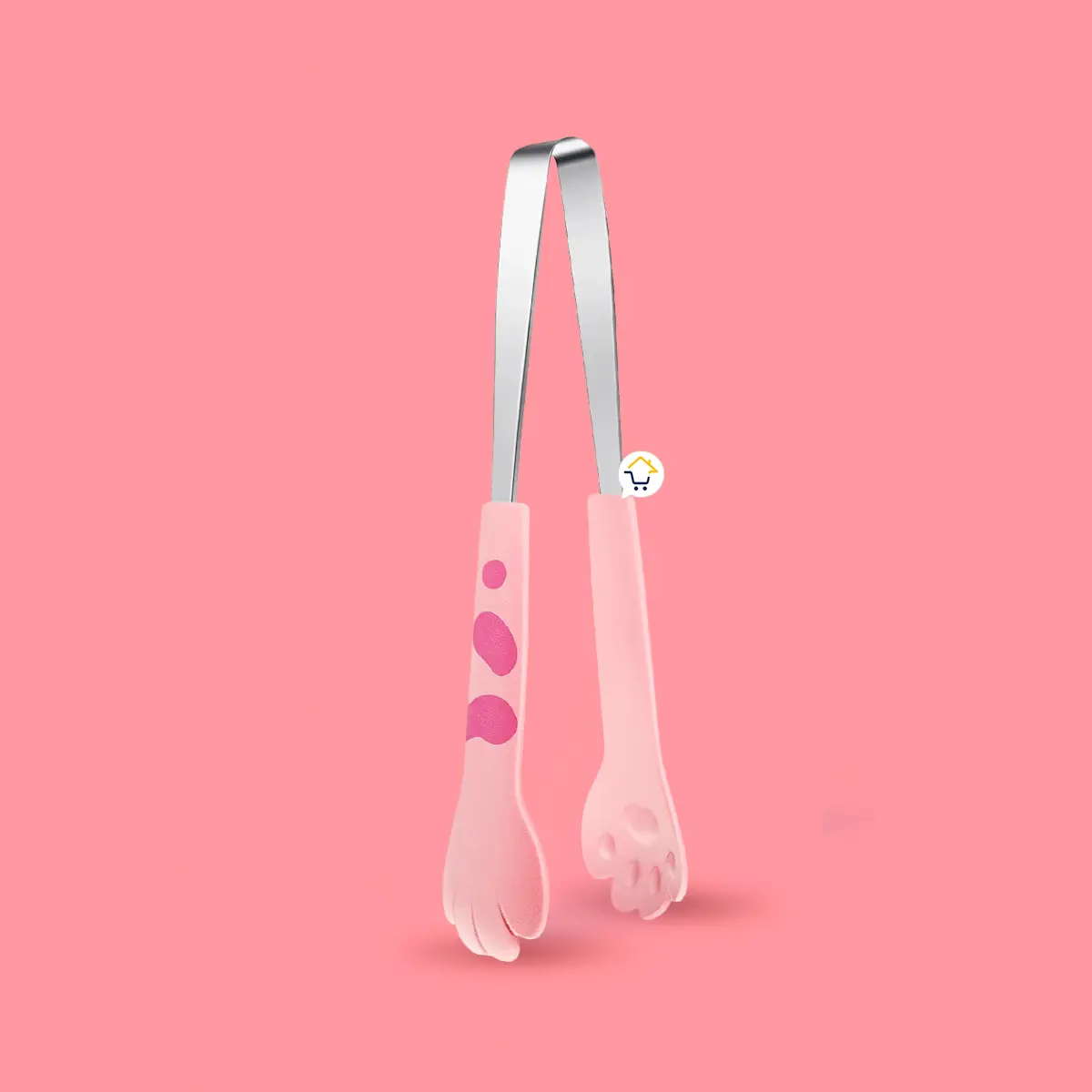 Pinza de cocina rosa con patitas de gatito, ideal para hornear y asar alimentos.