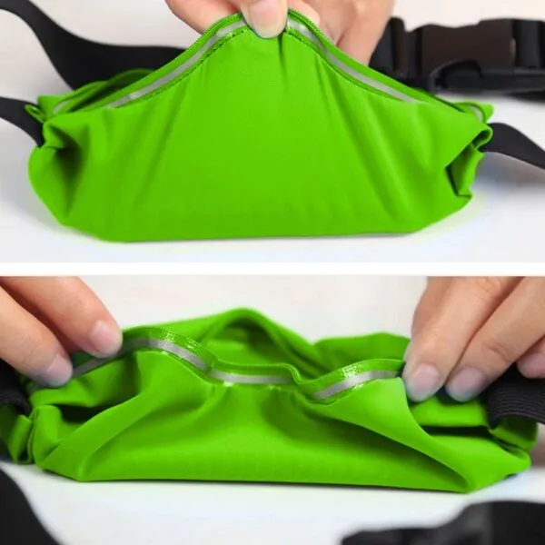 Riñonera deportiva verde con detalles reflectantes, ideal para celular.