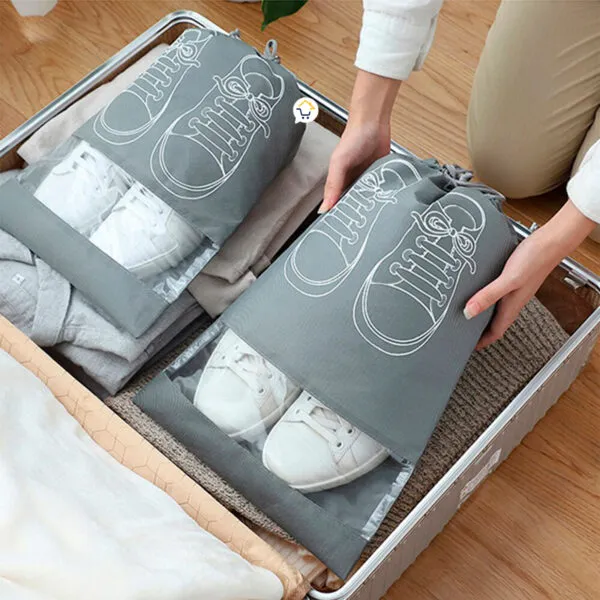 Organizador de zapatos anti-polvo, set x4 bolsas con visualización de zapatillas blancas para viaje.