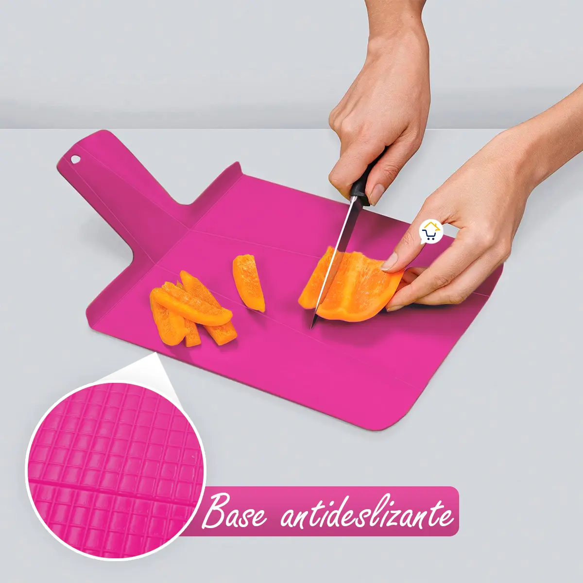 Tabla de cortar plegable antideslizante cortando pimientos. Incluye detalle de base.