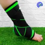 Tobillera deportiva negra y verde de compresión alta, ajustable, para soporte ortopédico del tobillo.