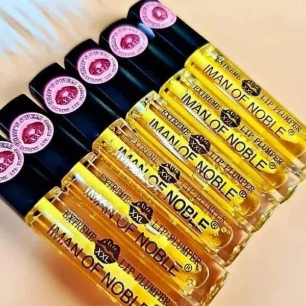 Set x2 Voluminizador Extreme XXL Lip Plumper de Iman of Noble en frascos dorados, brillo labial con detalle de labios XXL.