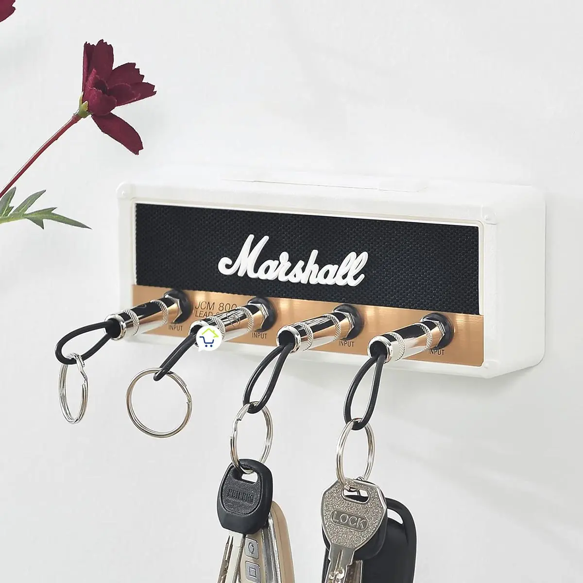 Portallaves amplificador Marshall con 4 entradas y llaveros, diseño rockero.