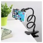 Soporte flexible de 60 cm para celular, ideal para mesa con planta y libros.
