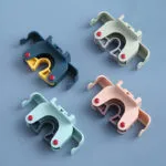 Set x2 Soportes para escobas y traperos con gancho adhesivo en varios colores.