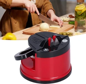 Afilador de cuchillos con pad de succión rojo y negro, ideal para cocina.
