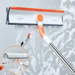 Trapeador limpiador de microfibra naranja y blanco para ventanas espumosas con mango de acero inoxidable.