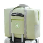 Maleta plegable verde impermeable, bolso de mano compacto y ligero para viajes.