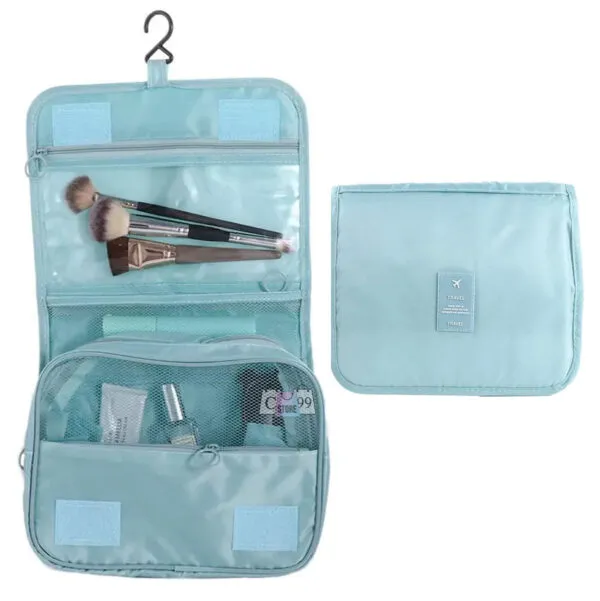 Cosmetiquera organizador de viajes azul con compartimentos, pinceles y productos.