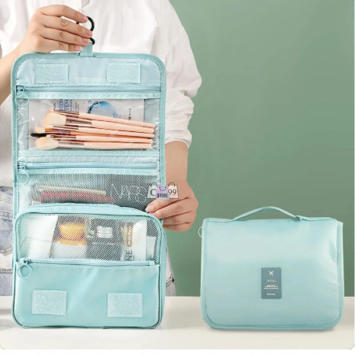 Cosmetiquera de viaje colgante para maquillaje y accesorios, bolso organizador azul claro.