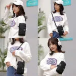 Mini bolso billetera porta celular manos libres negro para mujer con corazón decorativo.