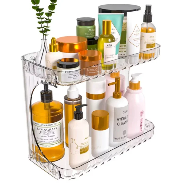 Estante organizador de cosméticos transparente de 2 niveles con varios productos de belleza y cuidado personal.