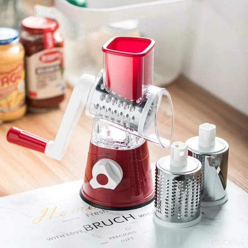 Rallador molino de verduras giratorio rojo con base de succión, accesorios de corte y recipientes.