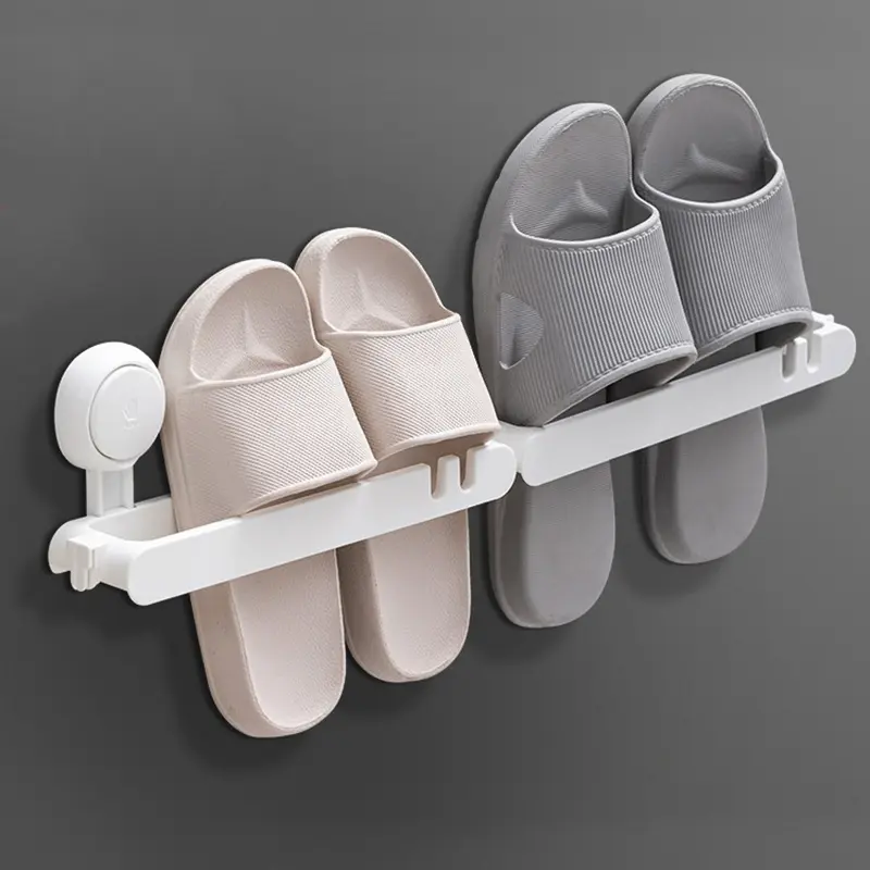 Zapatero adhesivo con estante para organizar zapatillas de baño, color blanco.