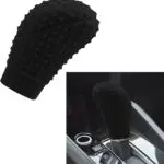 Forro relieve perilla palanca de cambios negra para carro, con textura de puntos.