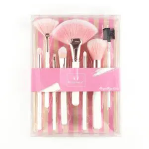 Kit de brochas para maquillaje Ruby Face Brush Kit: 7 piezas rosadas con mango blanco.