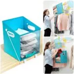 Cesta plegable Dady organiza ropa en clóset, con ventana transparente y asas.