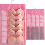 Organizador de closet rosa con brasieres y ropa interior en compartimentos.