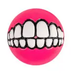 Pelota para perro rosa con forma de sonrisa, incluye sonido.