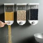 Dispensador de cereales para pared Fresh 1000ml: granos amarillos, blancos y negros cayendo en un vaso.