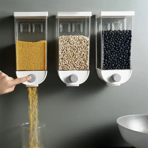 Dispensador de cereales para pared Fresh 1000ml: granos amarillos, blancos y negros cayendo en un vaso.