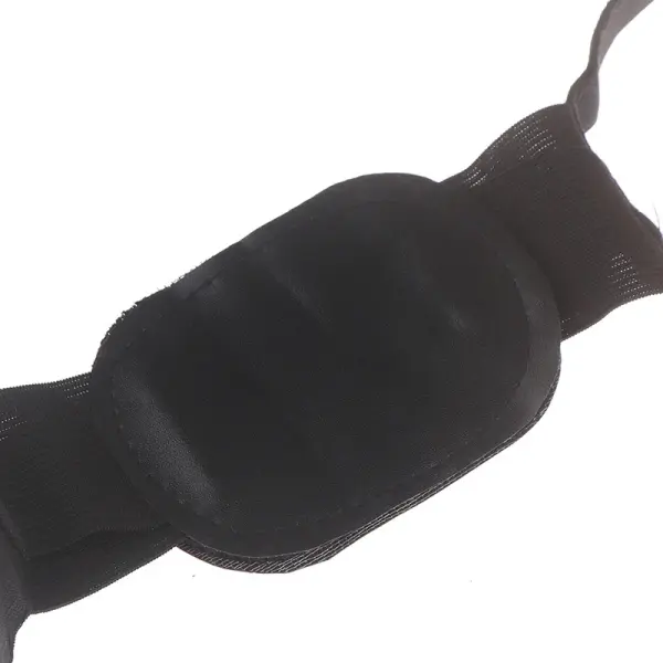 Corrector de postura lumbar unisex negro, ligero y ajustable, con banda de soporte visible.