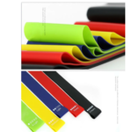 Set de 5 bandas elásticas de ejercicio, cada una con diferentes niveles de resistencia y color, para entrenamiento de fuerza.