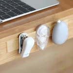 Set x2 cinta adhesiva doble faz silicona lavable 3m en escritorio junto a laptop y grapadora.