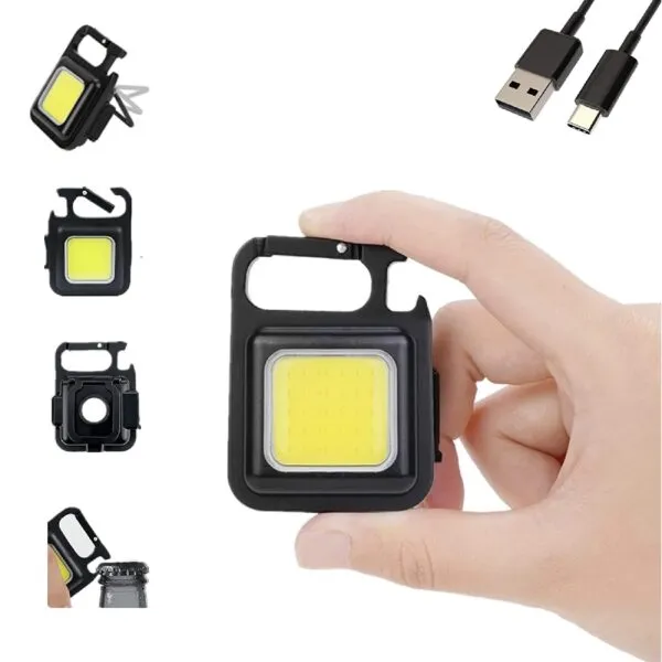 Mini linterna LED recargable USB con imán y abridor de botellas, ideal para llavero.