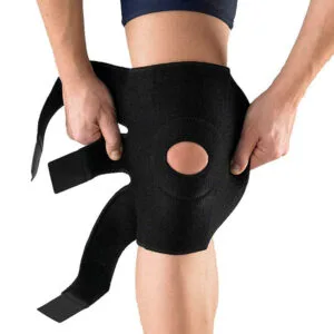 Rodillera ortopédica ajustable para alivio de dolor de rodilla.