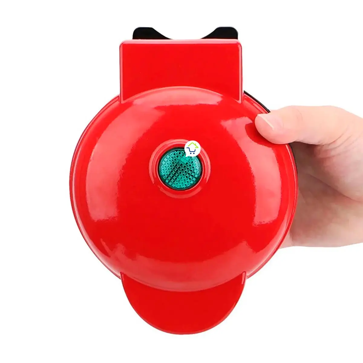 Máquina de mini donas roja con un indicador verde y mano sujetándola.