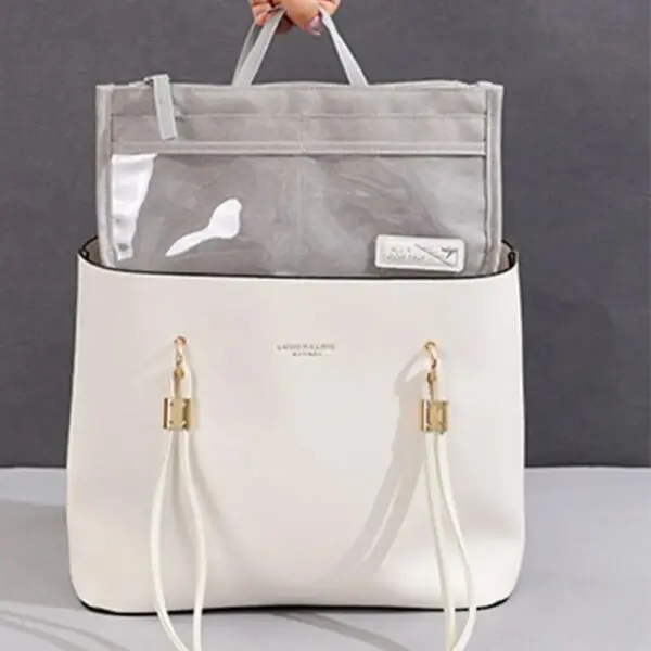 Bolso organizador Oasis blanco y gris, diseñado para mantener tus pertenencias ordenadas y accesibles.