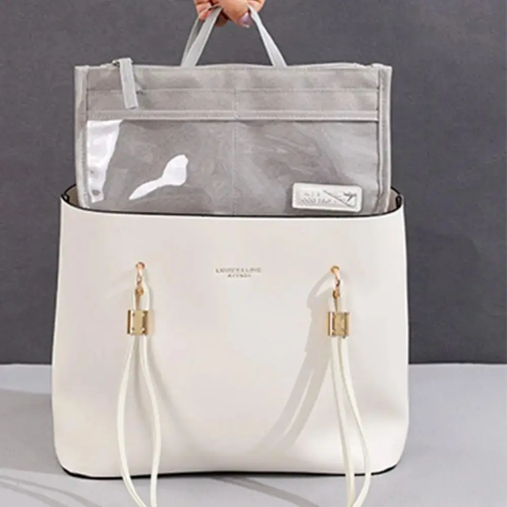 Bolso organizador Oasis blanco y gris, diseñado para mantener tus pertenencias ordenadas y accesibles.