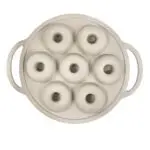 Molde de silicona para 7 donas en forma redonda con asas laterales.