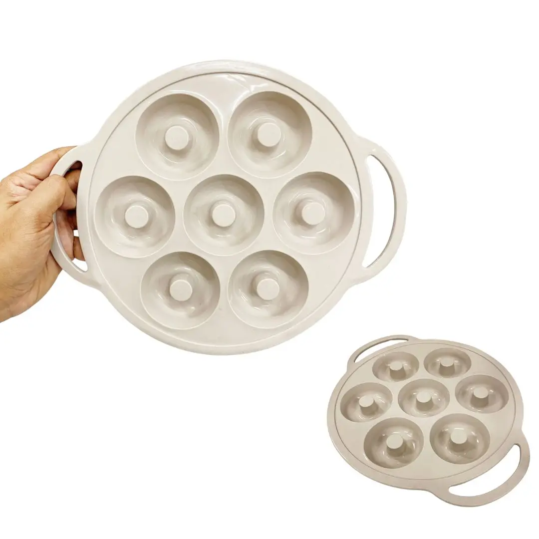Molde de silicona para 7 donas, con agarraderas y diseño circular apto para horno.