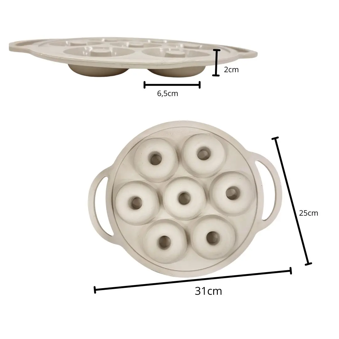Molde de silicona para 7 donas, con medidas de 31cm x 25cm y cavidades de 6.5cm de diámetro.
