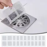 Set x100 malla desechable para drenaje de pisos, previene obstrucciones.