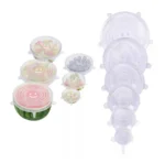Set de 6 tapas elásticas de silicona para alimentos, con diseño de oso sonriente, cubriendo recipientes y una sandía.